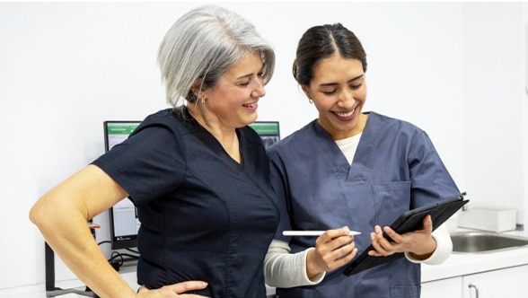 Dentist explaining an xray to a patient